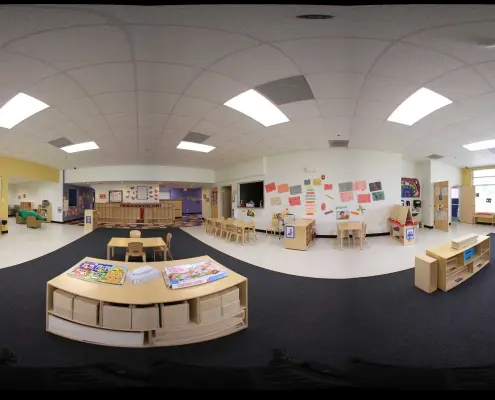 a child using Montessori constructive triangles to explore geometry